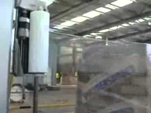 Automatic packaging line for heavy concrete bricks.wmv