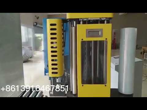 Automatic pallet wrapping machine