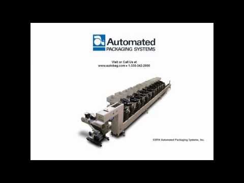 Automated Packaging Systems - Autobag Kit-Veyor Packaging Conveyor System