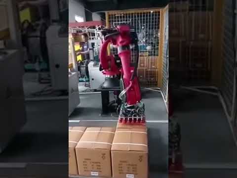 PP Strapping machine +robot palletizer for carton case.PP strapper +robotic palletizing machine