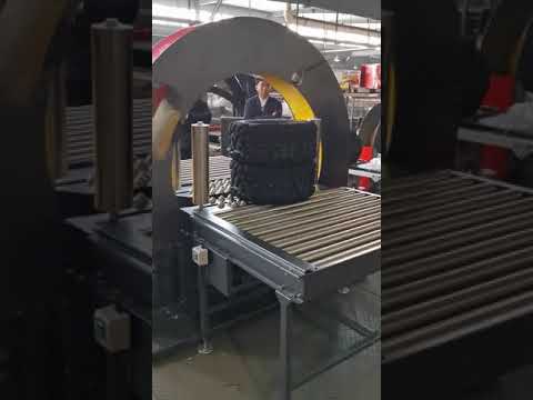 Tire packaging on orbital wrapping machine