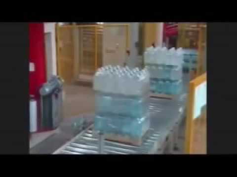 Rotary stretch wrapping machine and pallet wrapper