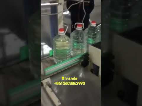 Automatic shrink wrapping machine for big pet bottle