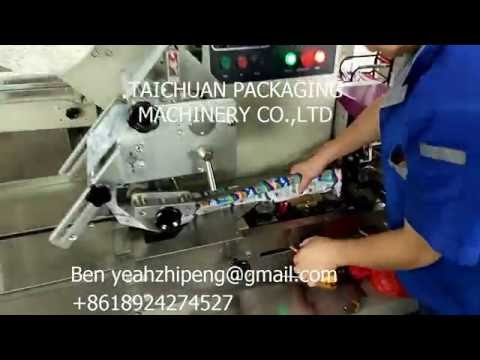 How to installing film roll on horizontal flow packing machine