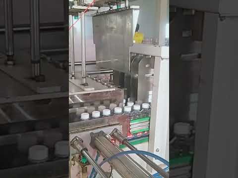 automatic shrink wrapping machine .