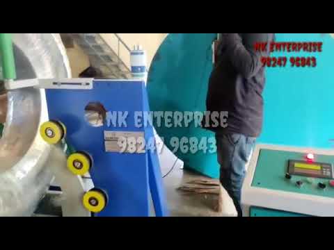 Irrigation pipe wrapping machine