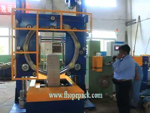 Coil packing machine and coil wrapping machine