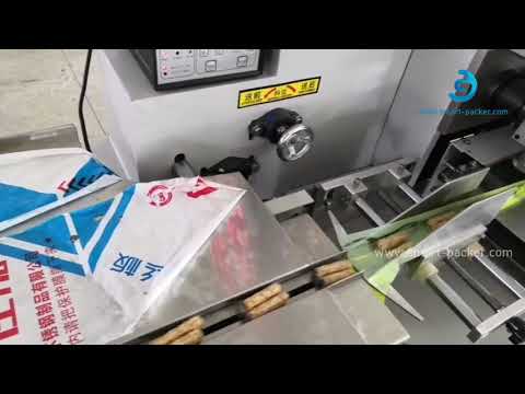 Automatic twin candy bar horizontal film wrapping bag packaging machine