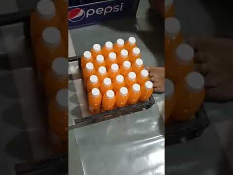 Manually Shrink film use to pack Juice/Soda bottles with Hot air gun