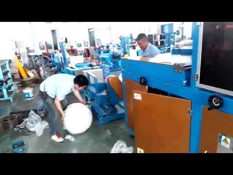 Automatic cable roll shrink wrapping machine