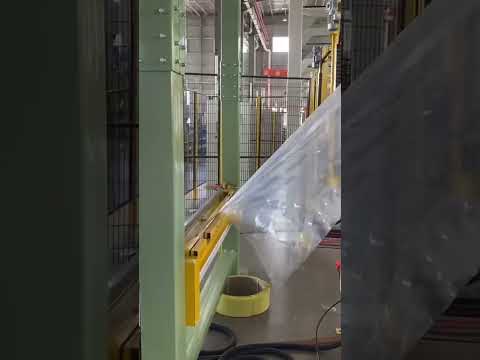 Arm rotation pallet wrapping machine with top sheet dispenser,Arm rotation pallet wrapper