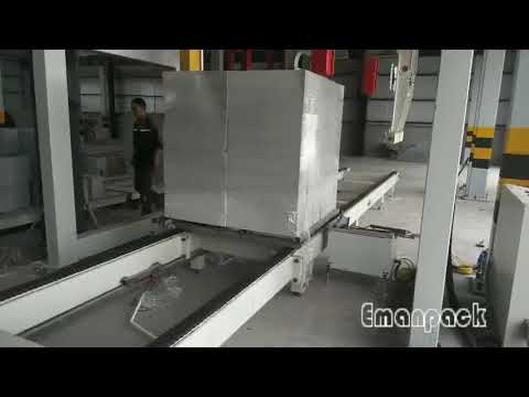 Building material packaging by rotary arm pallet wrapper