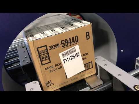 Compacta 6 SPR wrapping box full of cigarette cartons by Robopac USA