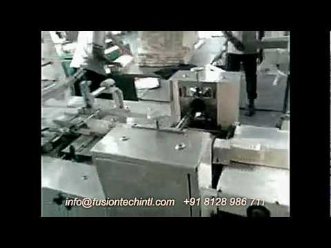 OVER WRAPPING MACHINE - HORIZONTAL FLOW WRAPPING MACHINE FUSIONTECH