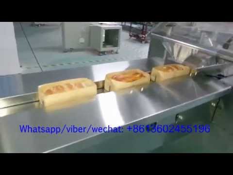 Horizontal reciprocating bread/pizza flow wrapping machine