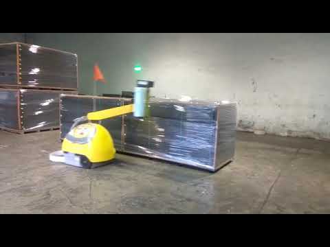 SIGNODE MAKE AUTOMATIC RANDOM SIZE PALLET WRAPPING MACHINE