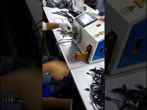 Tabletop cable coiling strapping machine