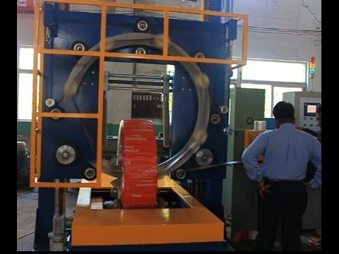 Coil packing machine and coil wrapping machine