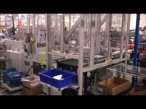 STI ParcelPack automated packaging system, photo cards, e commerce