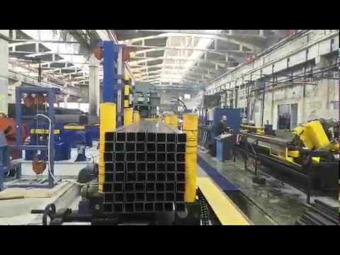 Automatic steel tube bundle steel strapping and packing machine