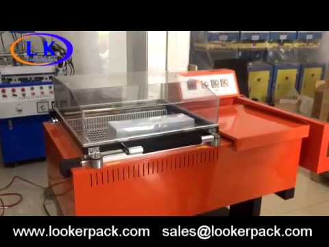 Semi auto shrink wrapping machine