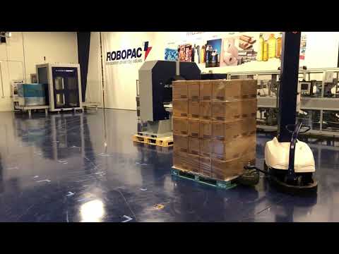 Robot Master portable semi automatic stretch wrapper wrapping a tall load - Robopac USA