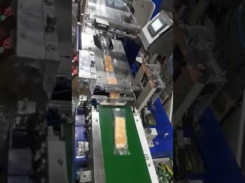 Bread Packing Machine | Horizontal Flow Wrap Packing Machine | Shaped Food Product Packing machine |