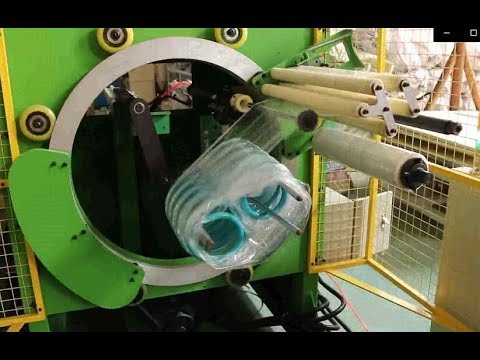 Automatic spring packing machine, coil spring wrapping machine