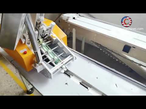 Card tag automatic paging feeding horizontal flow type film wrapping bag sealing packaging machine