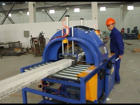 Horizontal orbital stretch wrapper and wrapping machine for wooden