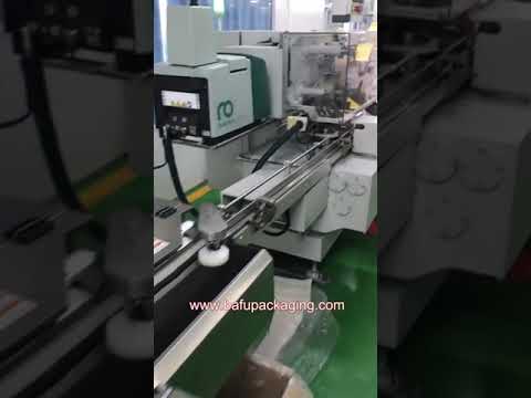 Chocolate fold wrapping machine, chocolate band fold wrapping machine, chocolate packaging machine