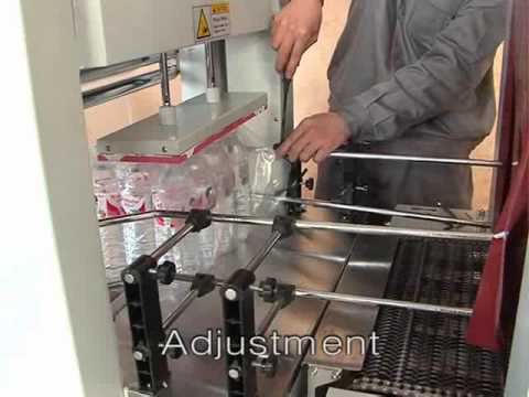 Semi-auto shrink wrap PE film packaging machine.flv