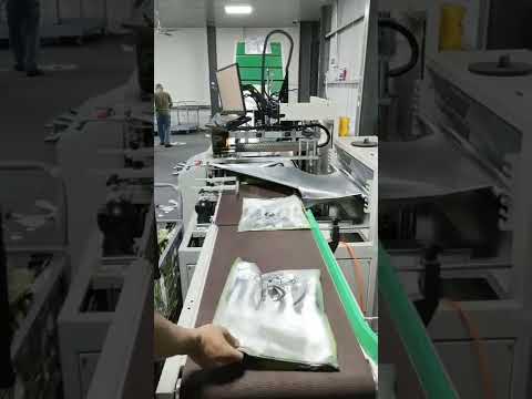 Automatic bagging machine for clothes E commerce packaging, packaging speed up to 1500 packs/min.