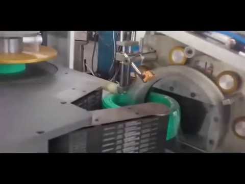 Cable coil winding and film wrapping machine