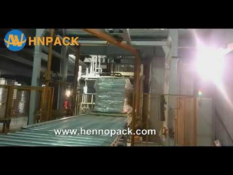 Hennopack in line fully automatic rotary arm pallet stretch wrapper with top foil wrapper