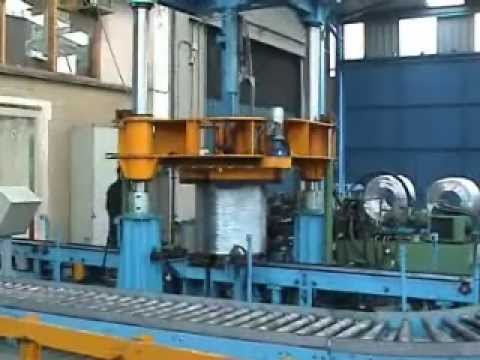 Automatic wire coil compactor and strapping machine