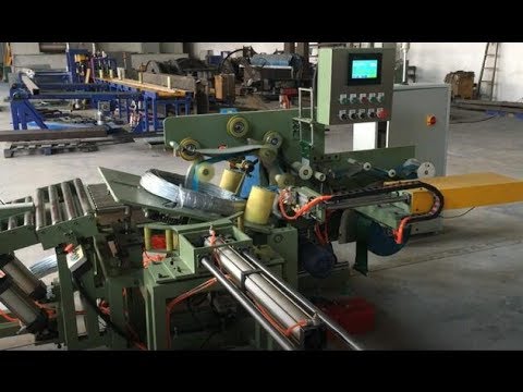 Wire wrapping machine and coil packing machine