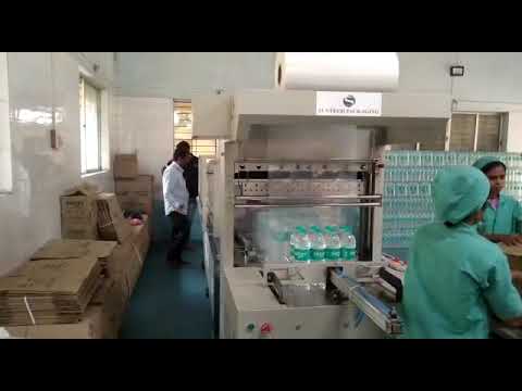 Water bottles Semi Automatic Web sealer with Shrink Wrapping Machine - SunTech Packaging 9820778501