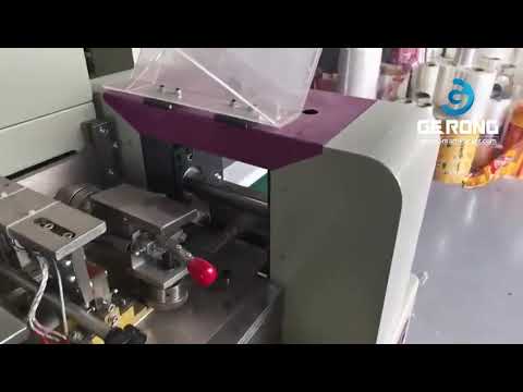 Disposal teeth floss horizontal type film wrapping sealing bag packaging machine