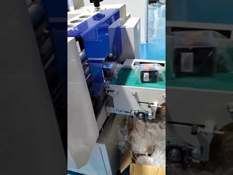 Automatic flow wrapping shrinking machine for small boxes