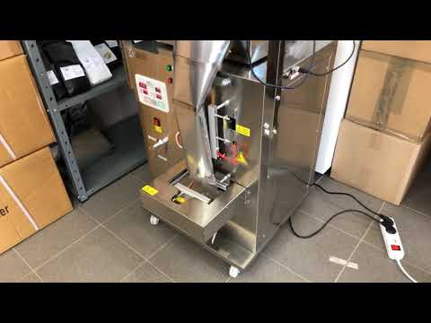 Automatic packing machine for coffee.