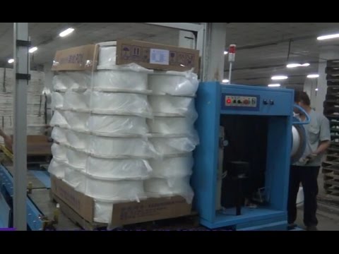 Automatic rotate arm stretch wrapper for pallet