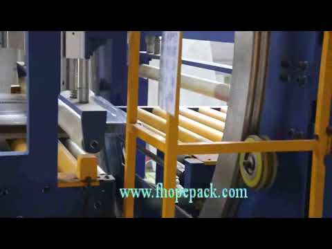 Automatic orbital stretch wrapper+bubble film covering for door packing