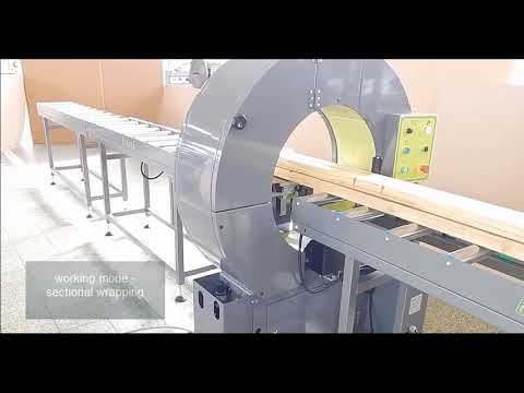 Horizontal stretch wrapping machine for wooden and board