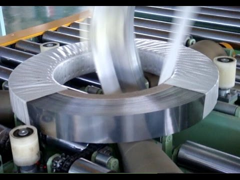 Coil packing line by film and paper