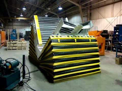 Omni Metalcraft Corp. Upender with Trough Conveyor