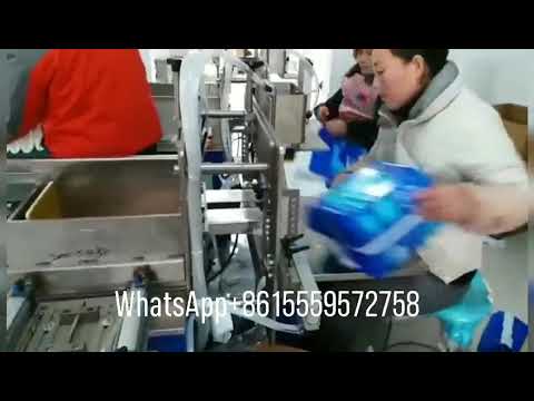 Semi-automatic packaging machine for baby diaper adult diaper sanitary pad bag filling and sealing