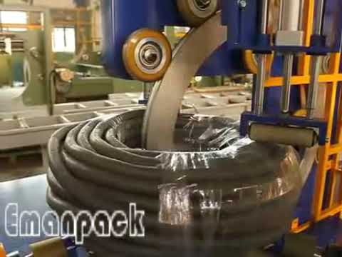 Corrugated hose rolls packaged by horizontal coil wrapping machine