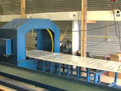 Horizontal stretch wrapping machine.