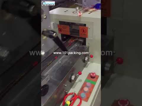 Automatic sweet candy energy bar bag horizontal flow film wrapping packaging machine candy bag packi